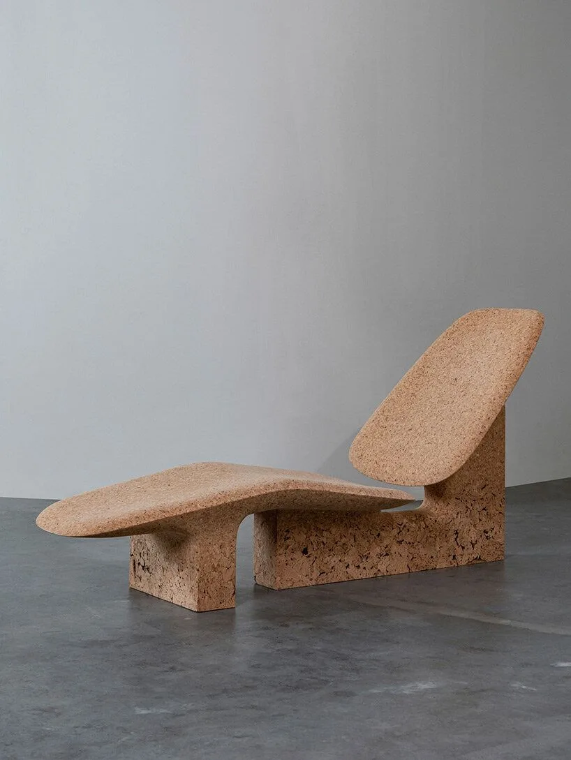 Sculptural cork furniture with rounded forms in a gray interior